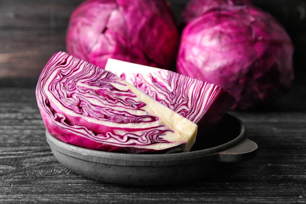 Whole and quarted red cabbage