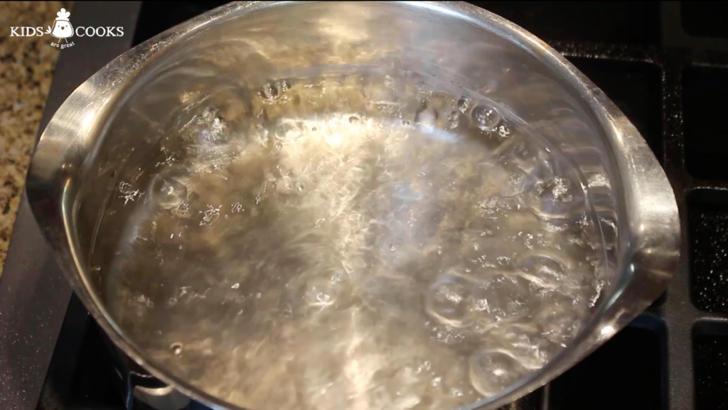 Boil 3 cups of water in a sauce pan