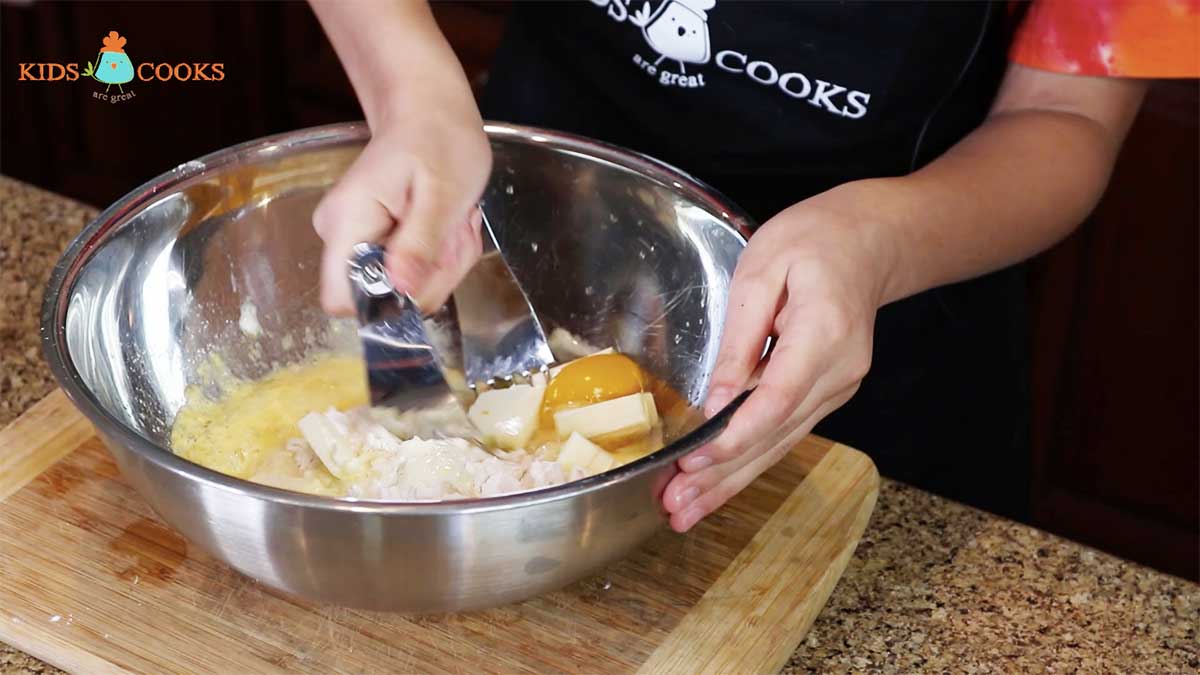 Use-a-pastry-cutter-to-combine-the-ingredients-together-and-form-a-dough