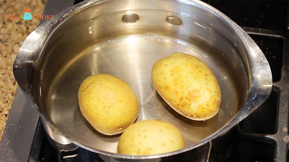 Boil three small potatoes until cooked