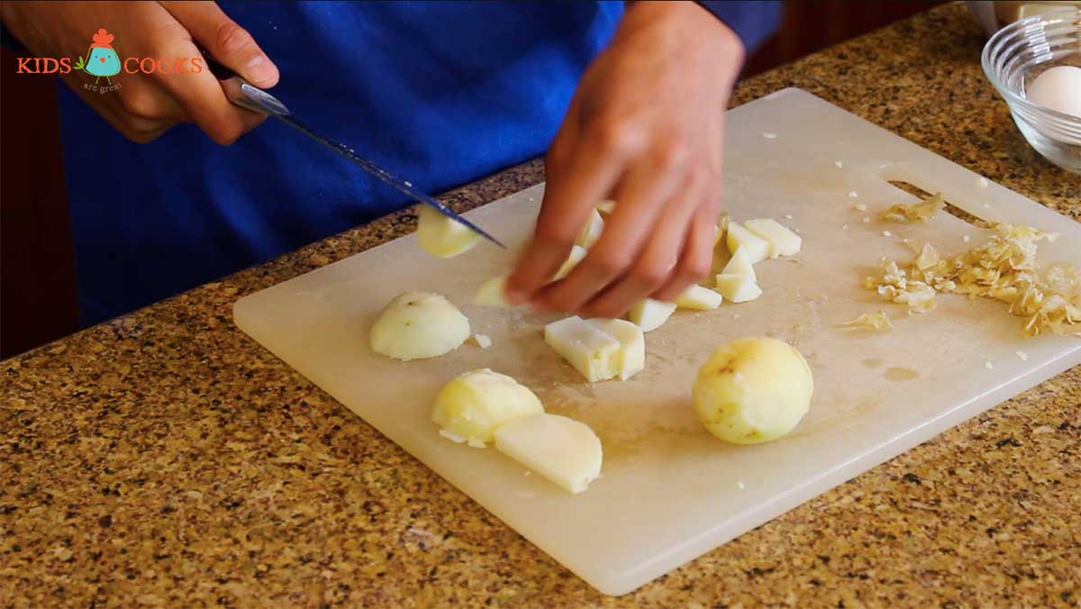 Once cooled, peel and slice the potatoes